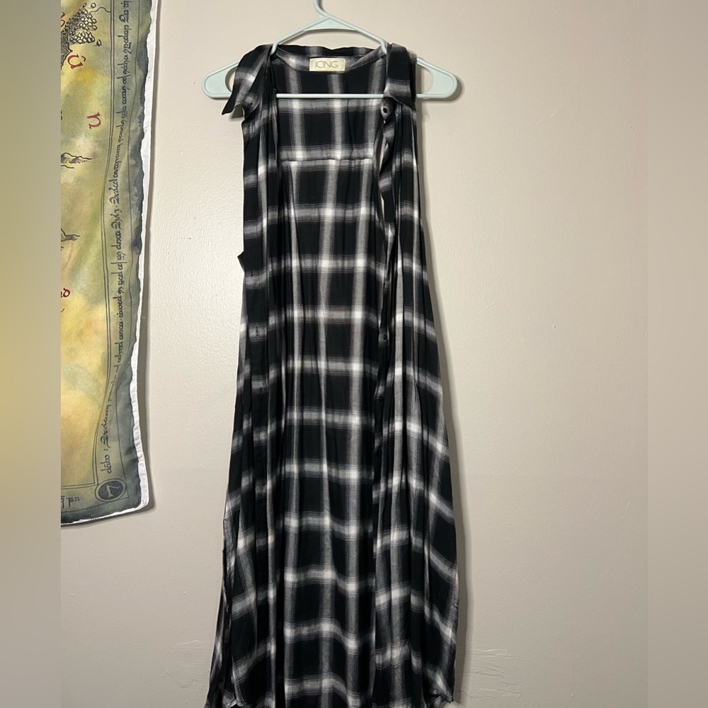 Long, black and white plaid sleeveless duster